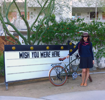 Travel expert, Jennine Cohen biking to work with GeoEx.