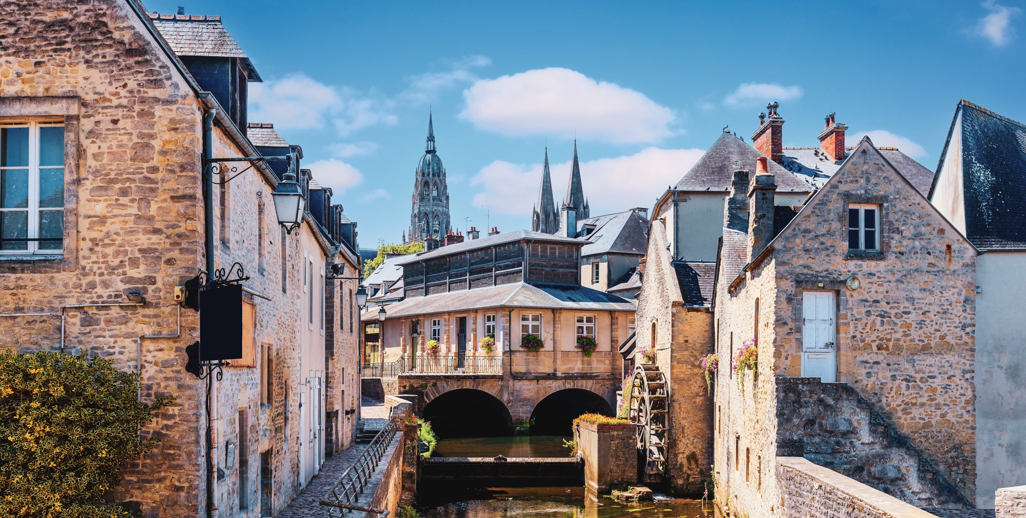 Bayeux, Normandy in northwestern France. The historic centre, the Notre Dame Cathedral and the Aure river.
