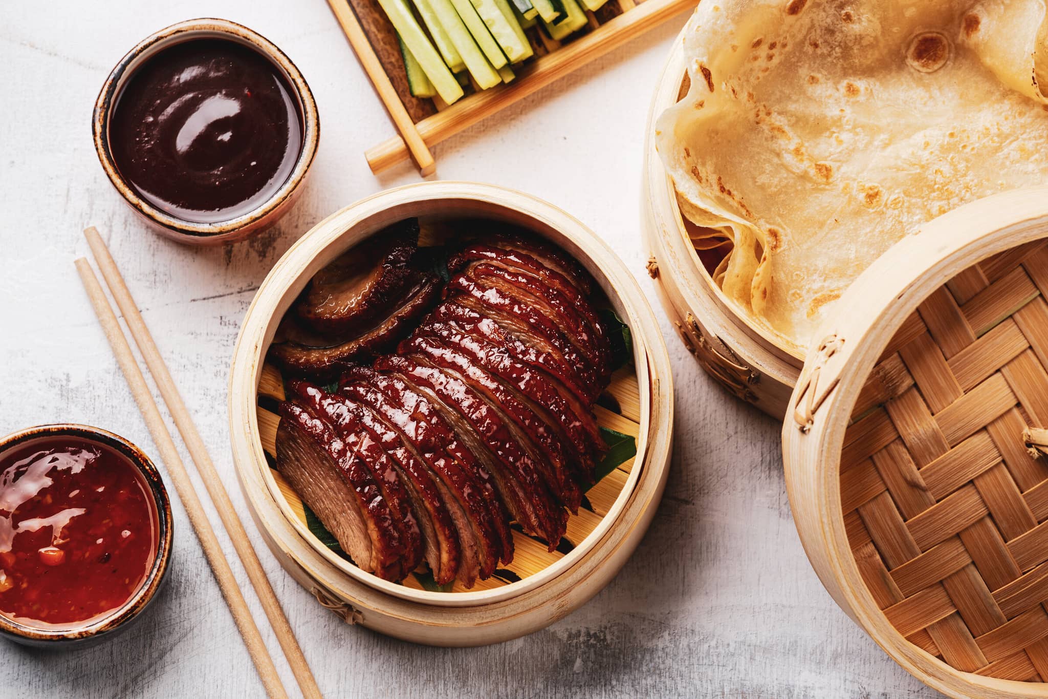 The Grand Silk Road by Train gallery Gallery2 PekingDuck China GettyImages 918057036 Lisovskaya