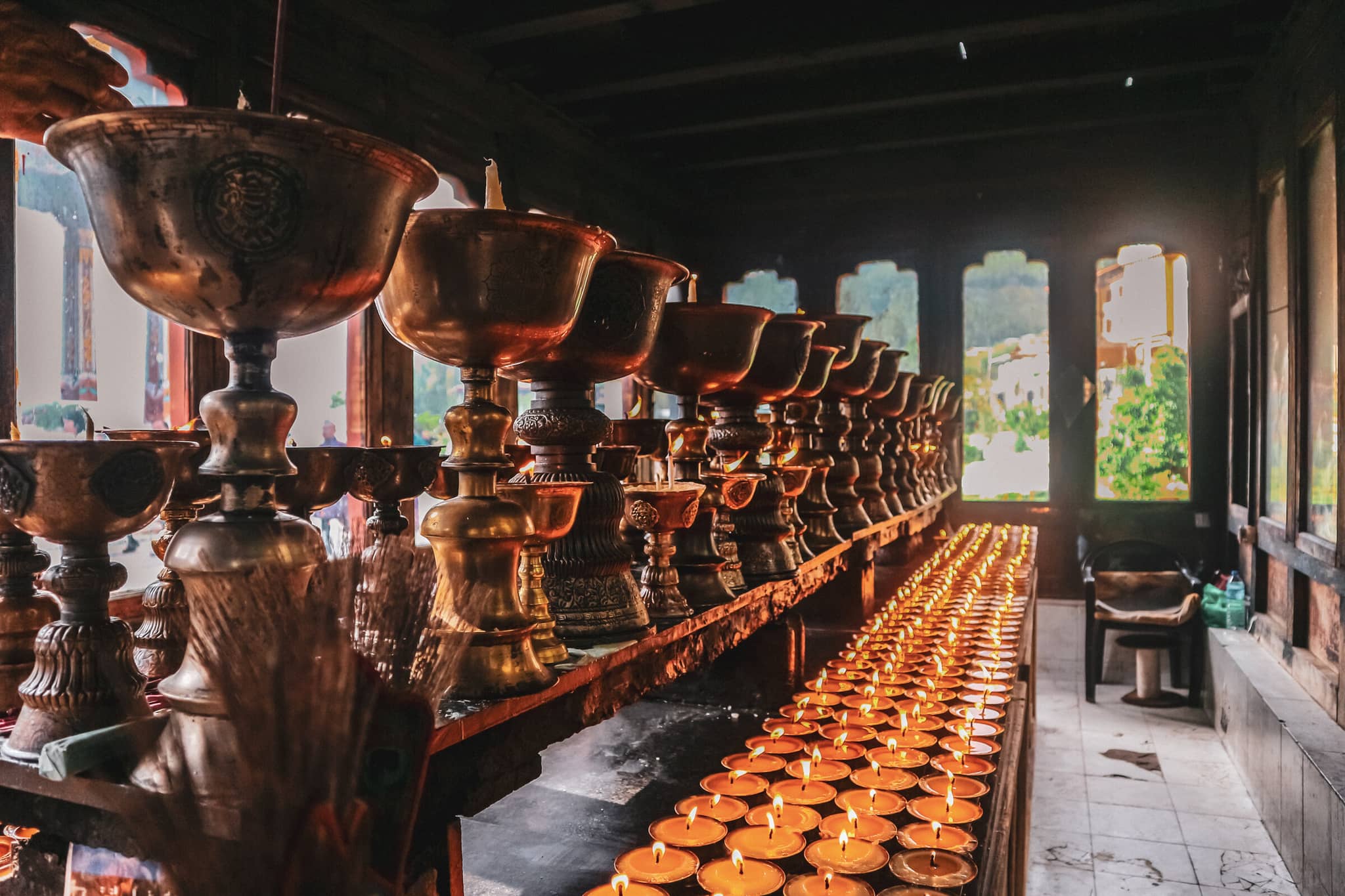 Bhutan Insider gallery Gallery4 PrayingCandles Bhutan GettyImages 695787008 IpekMorel