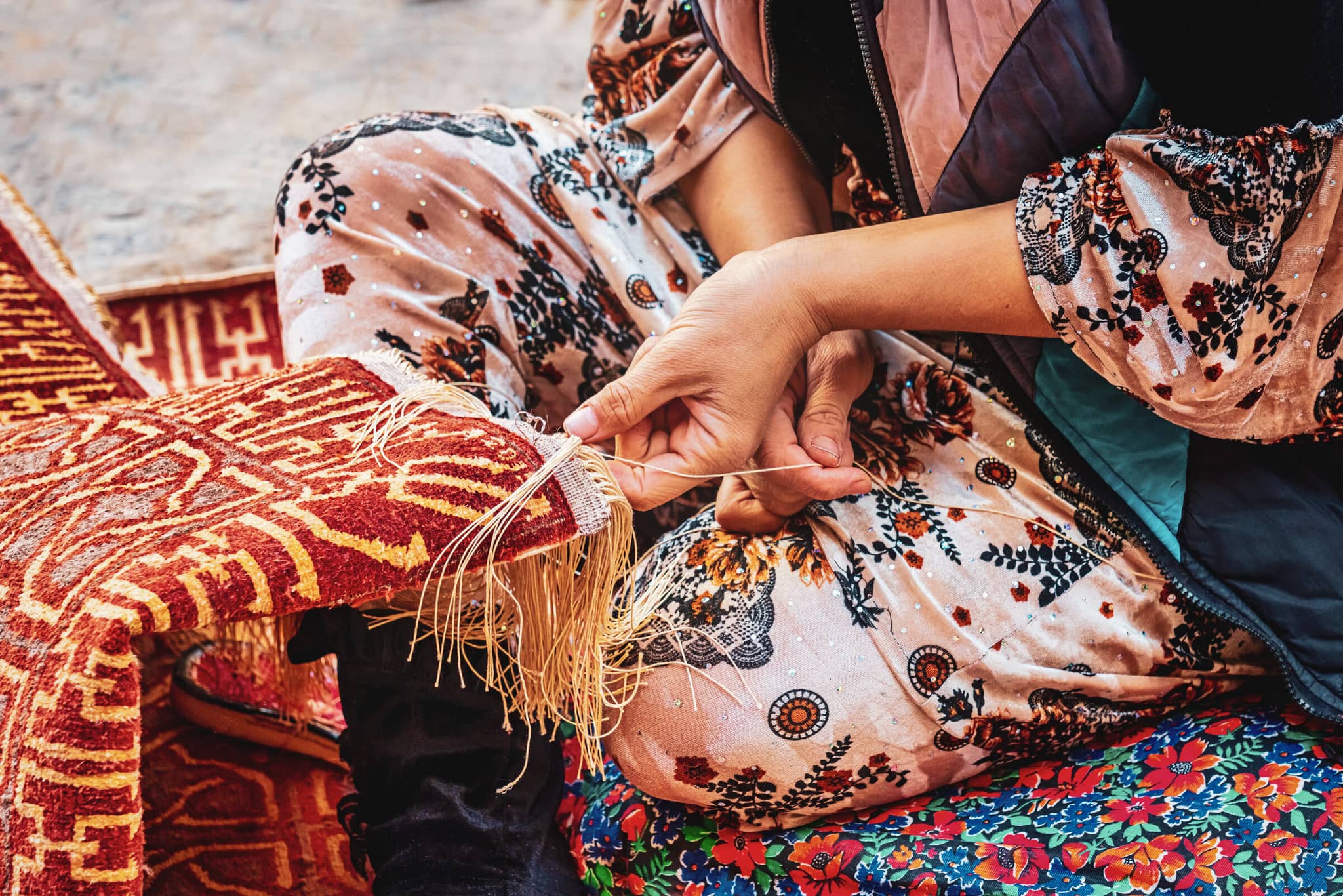 Republics of the Silk Road gallery Gallery4 UzbekCarpetWeaver Uzbekistan GeoExLuxuryTravel GettyImages 1189748682 Mlenny