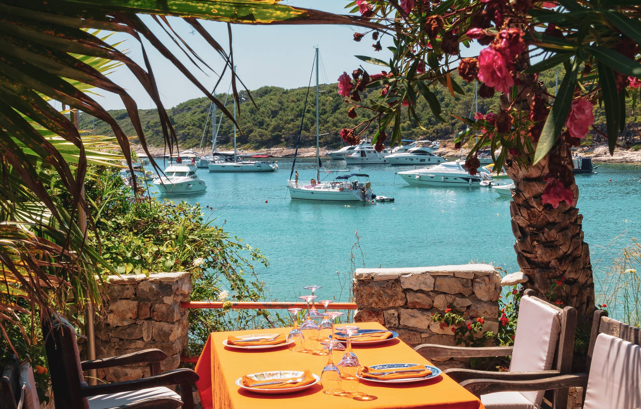 Dining table overlooking Milne Bay in Hvar, Croatia