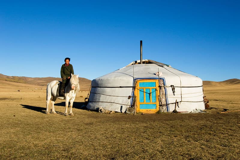 Nomad on horse in front of yurt AS25 AWR0092