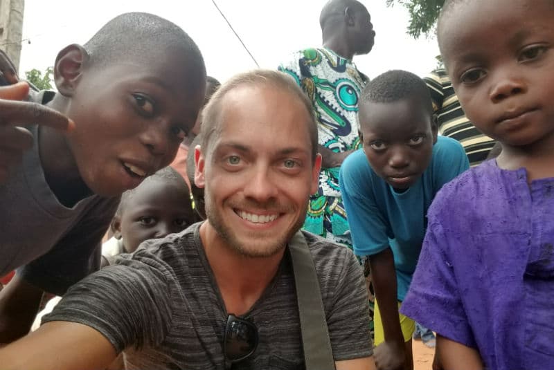 jesse knight meet geoex travel experts with african children in benin
