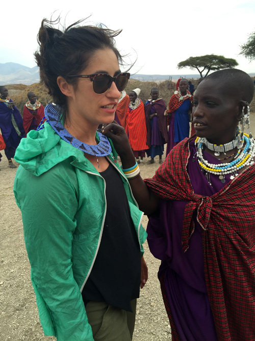 Travel Expert Jennine Cohen with Massai in Africa with GeoEx.