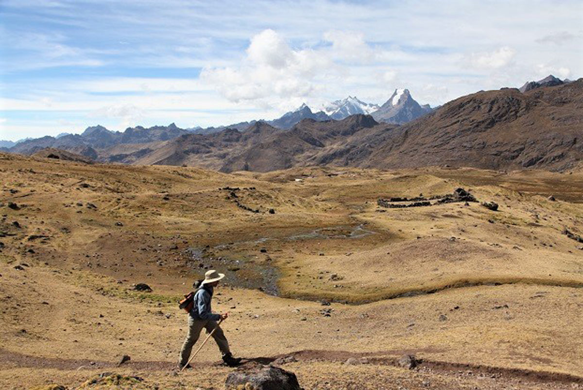 Hiker on the Lares Trek in Peru, with GeoEx