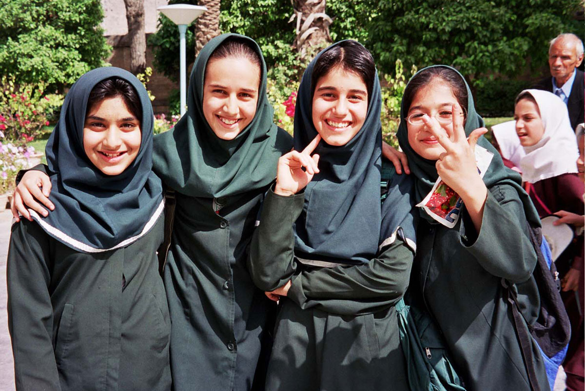 Meeting friendly locals, girls at Saadi Teahouse in Iran, with GeoEx