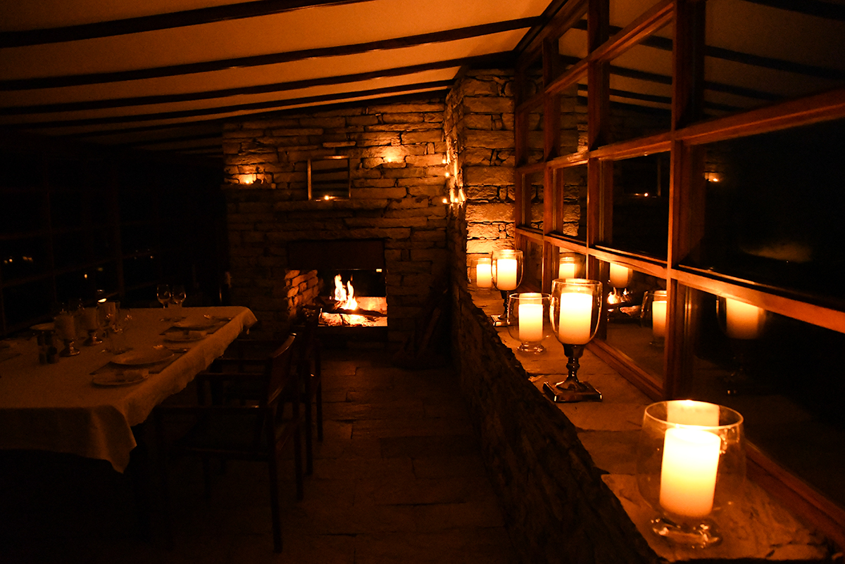 Candlelight in the dining room of Leti 360 lodge in the Himalayas in India