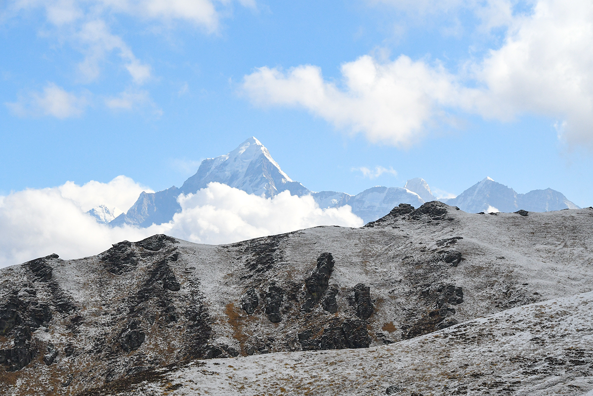 Himalayan peaks seen just over Kuari Pass in India