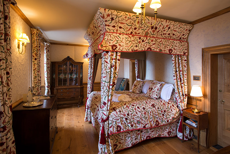 Elegantly appointed bedroom at Mingary Castle Hotel, Scotland