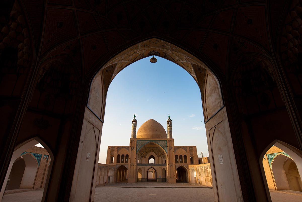 Agha Bozorg Mosque, viewed through an archway, Kashan, Iran
