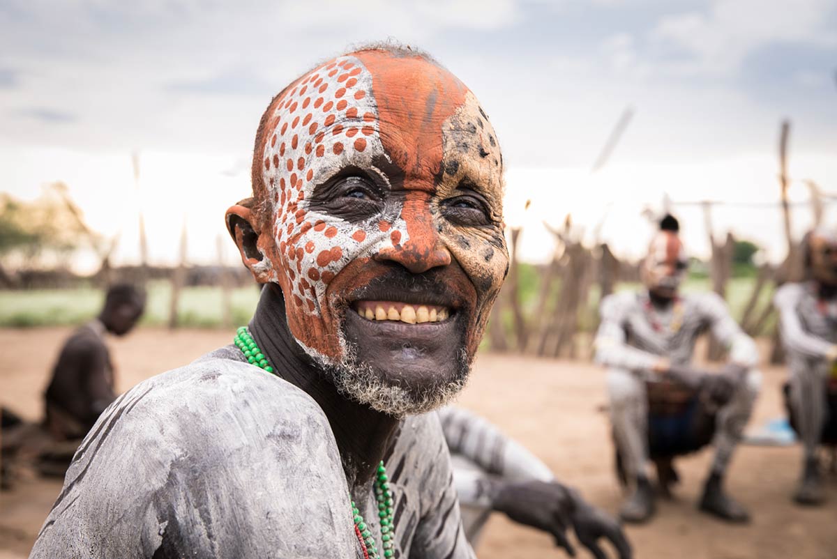 Kara man during body paint ceremony, Omo Valley, Ethiopia