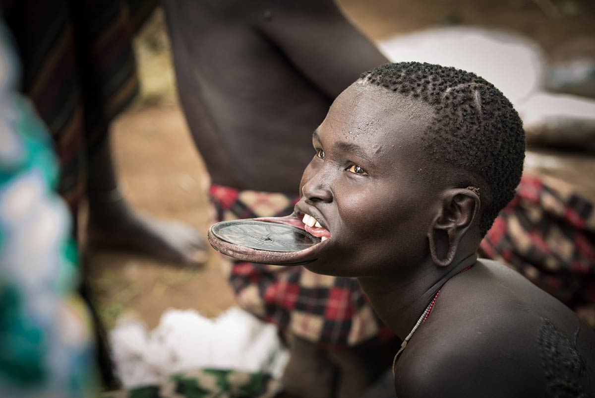 Mursi woman with traditional lip plate, Ethiopia