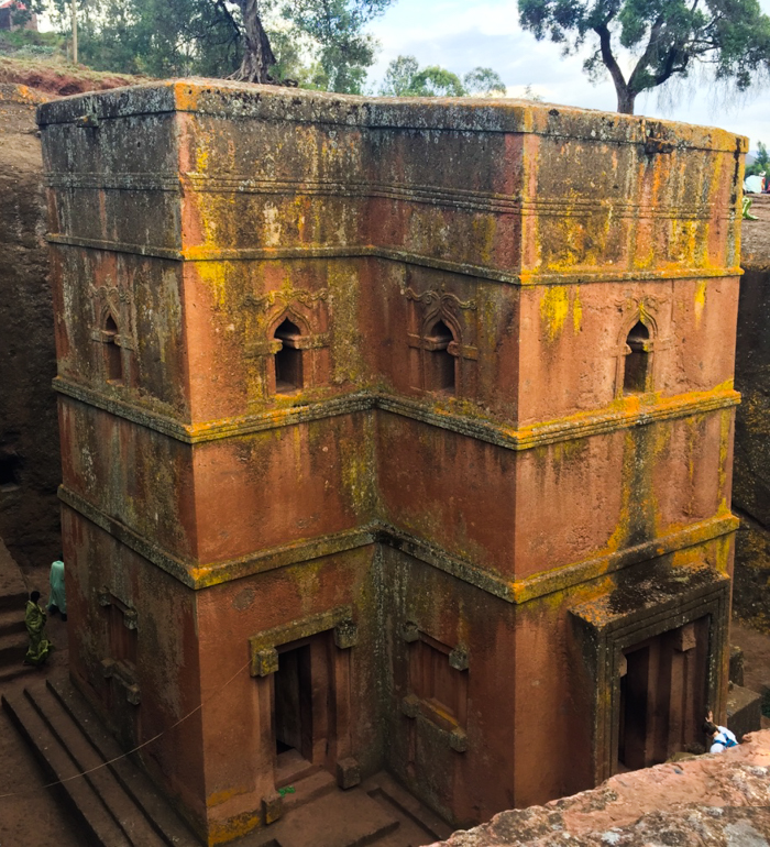 Visiting a rock carved church in Lalibela, Ethiopia with GeoEx.