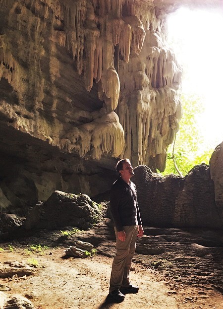 Gazing up at a cave in Phong Nha-Ke Bang National Park, Vietnam | Cave Adventures with GeoEx