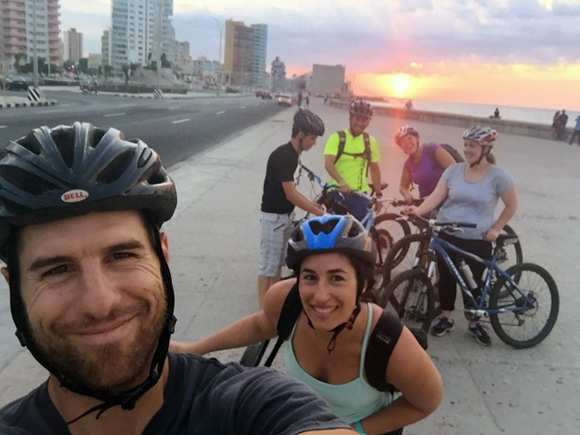 Riding bikes on the Malecon in Havana Cuba with GeoEx.
