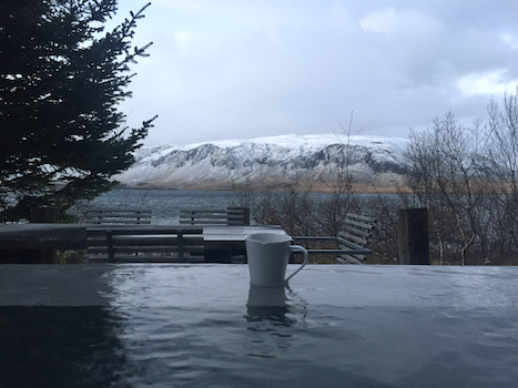 Sipping tea in hot tub at private home in Iceland with GeoEx