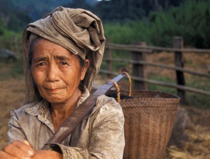 Hmong village woman, Laos with GeoEx