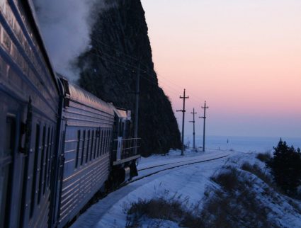 Golden Eagle luxury train traveling past Lake Baikal in winter, Trans-Siberian with GeoEx
