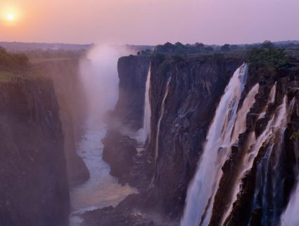 Misty sunrise over Victoria Falls National Park, Zimbabwe