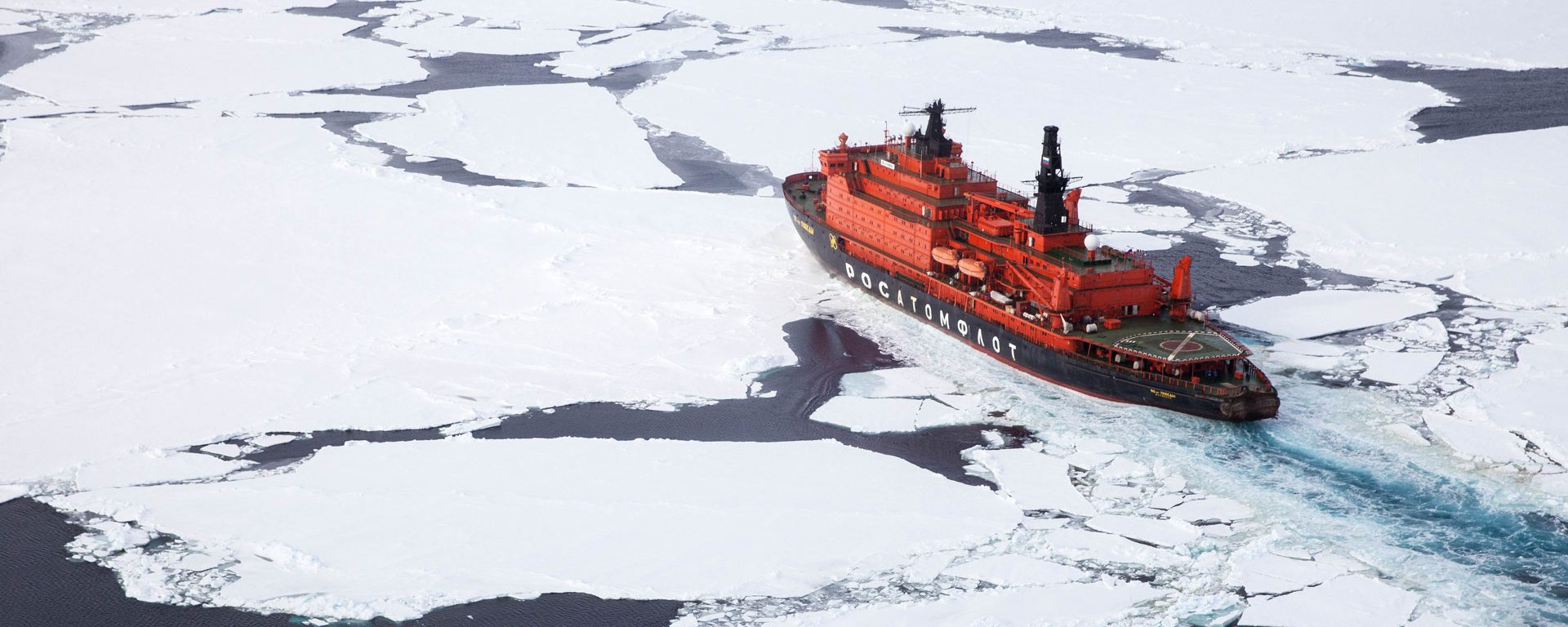 Quark 50 Years of Victory icebreaker cutting path through the Arctic sea