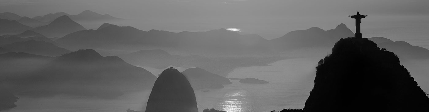 Rio de Janeiro landmarks: Christ the Redeemer and Sugar Loaf in the mist at sunrise, Brazil