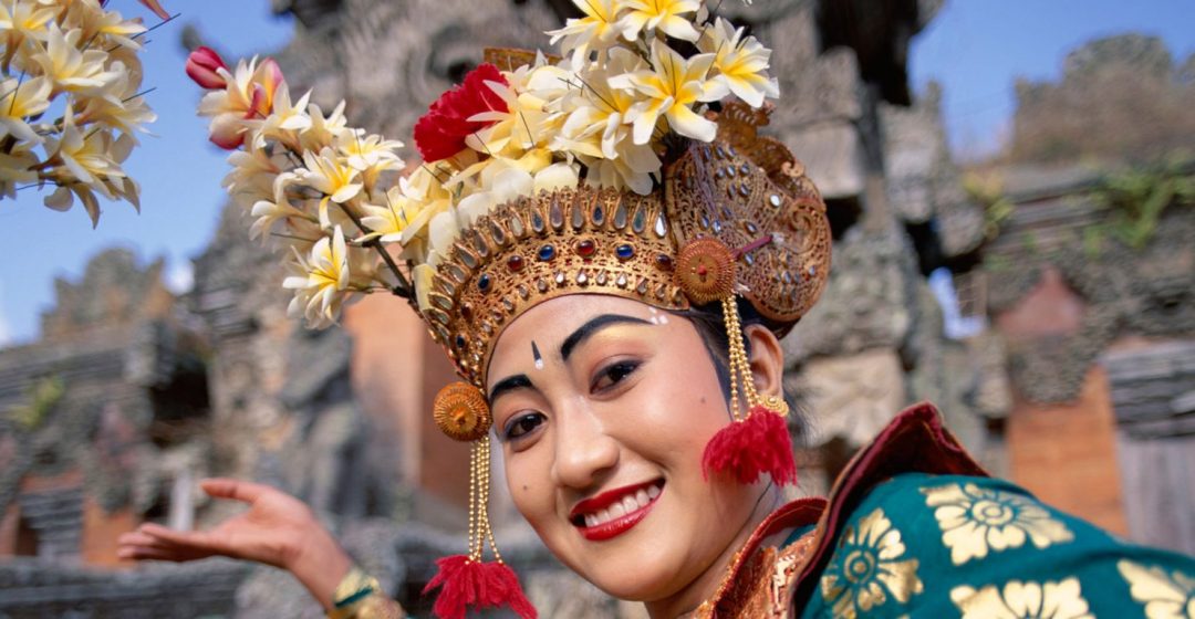 Woman dressed in traditional Legong dance costume, Bali, Indonesia