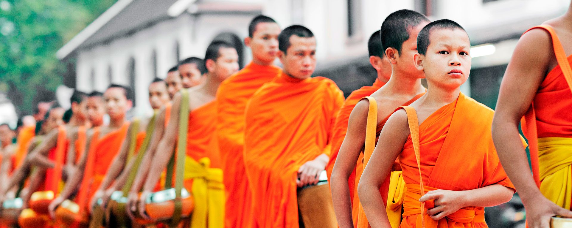 Monks processing for early morning alms in Luang Prabang, Laos
