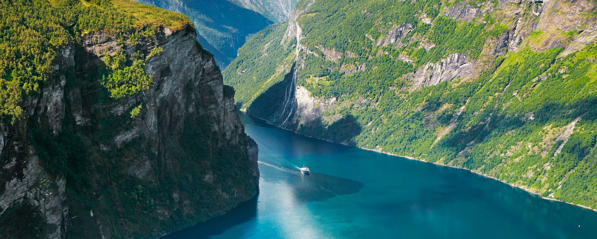 A motorboat glide across Geiranger Fjord, Norway
