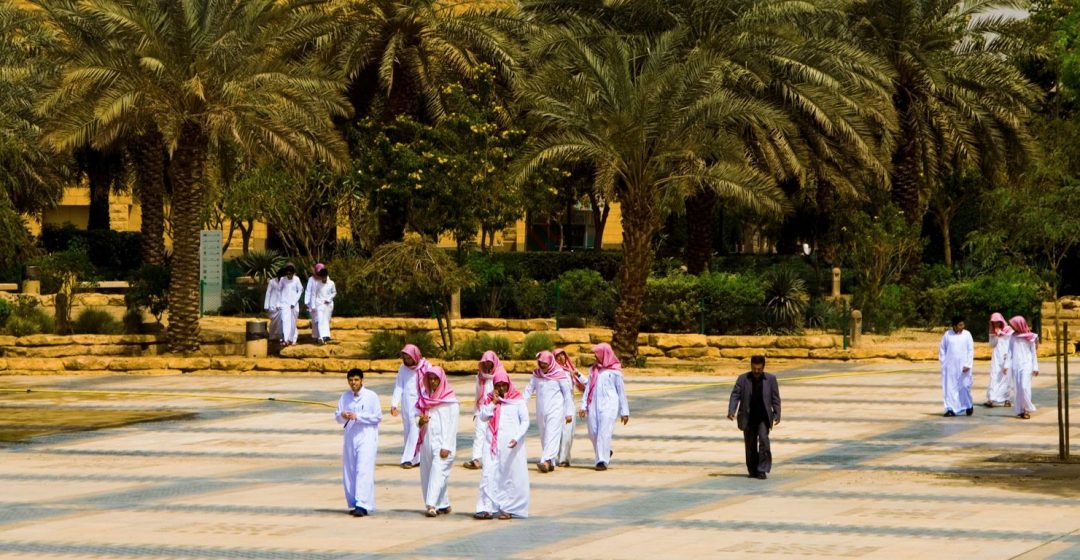A group of students in the square in front at the National Museum, Riyad, Saudi Arabia