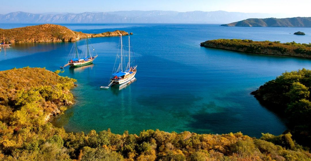 A gulet (traditional Turkish sailing boat) mooring at Tuzla Bay on the Aegean coast, Turkey