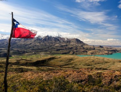 Chilean flag overlooking Lago General Carrera in Puerto Ibanez, Chile