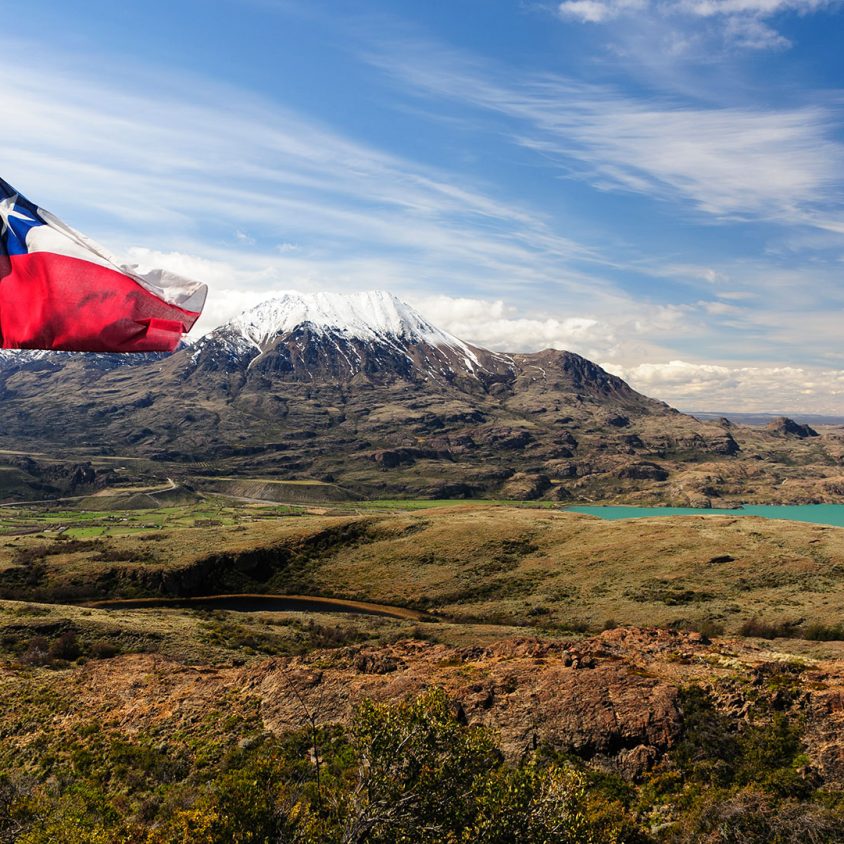 Chilean flag overlooking Lago General Carrera in Puerto Ibanez, Chile