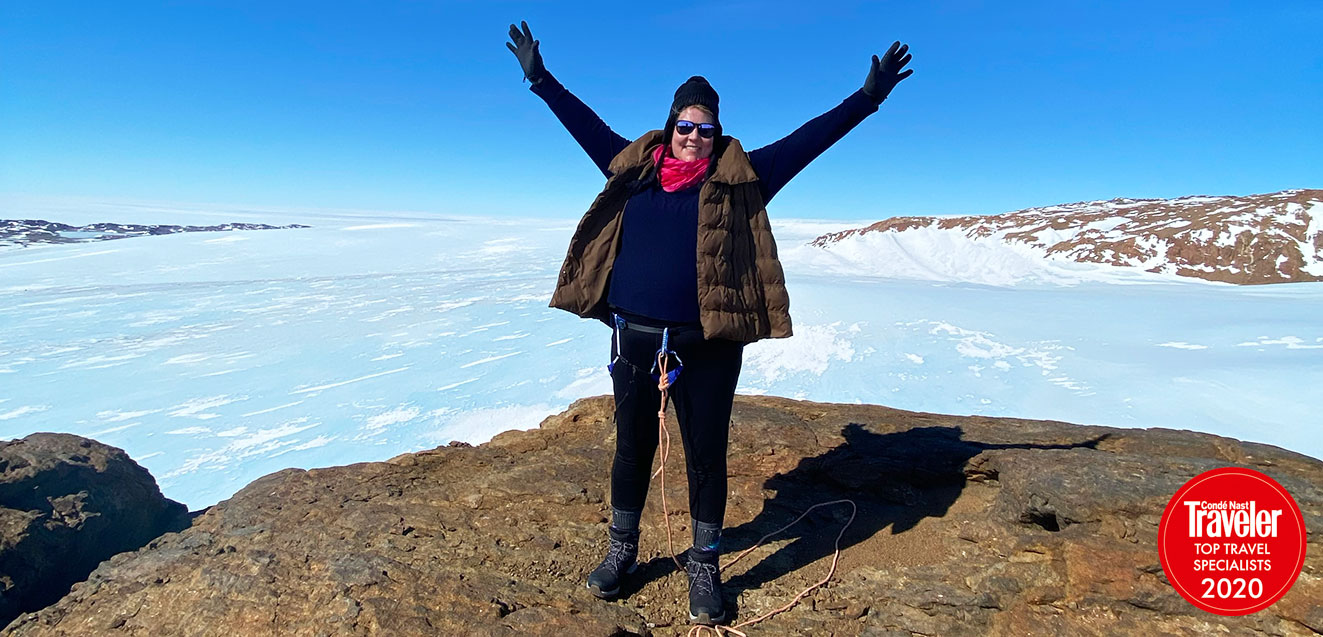 Kate Doty at the summit of a nunatak in Antarctica