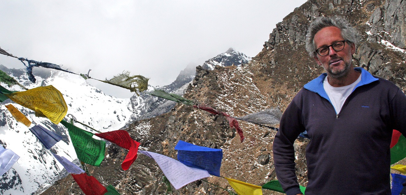 GeoEx Trek Leader Bart Jordans at Gangkhar Puensuum base camp in Bhutan