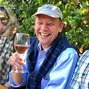 GeoEx Trip Leader Don George raises a glass of wine