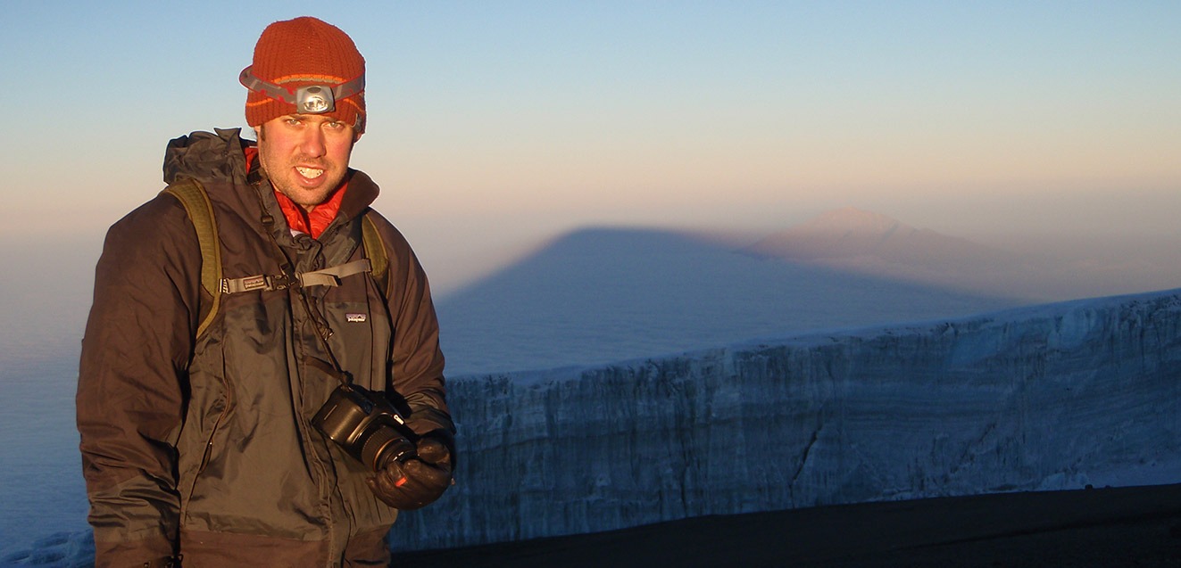 GeoEx CEO Brady Binstadt on the summit of Mount Kilimanjaro, Tanzania