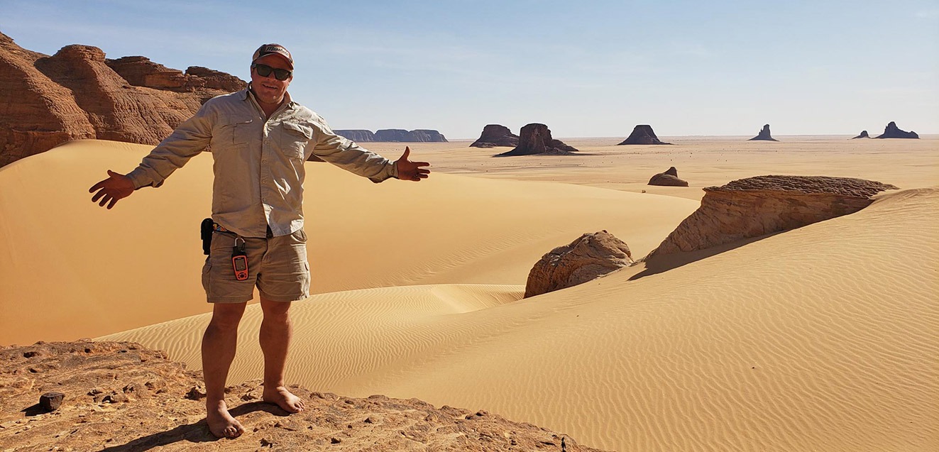 GeoEx trip leader Brad Hansen in the Ennedi Desert, Chad