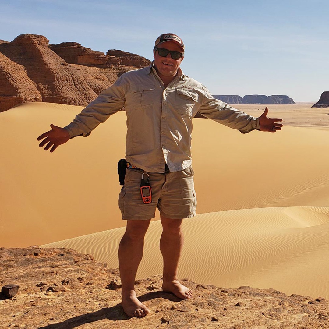 GeoEx trip leader Brad Hansen in the Ennedi Desert, Chad