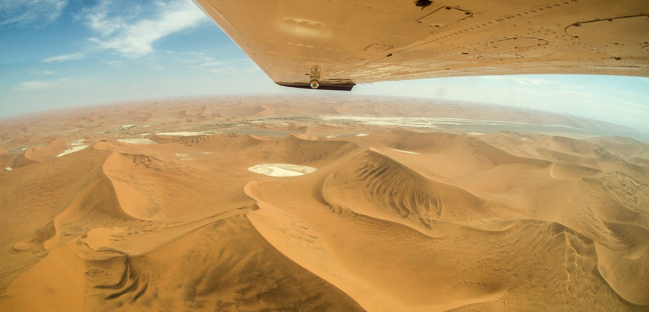 A sea of sand dunes seen from a safari flight over Namibia
