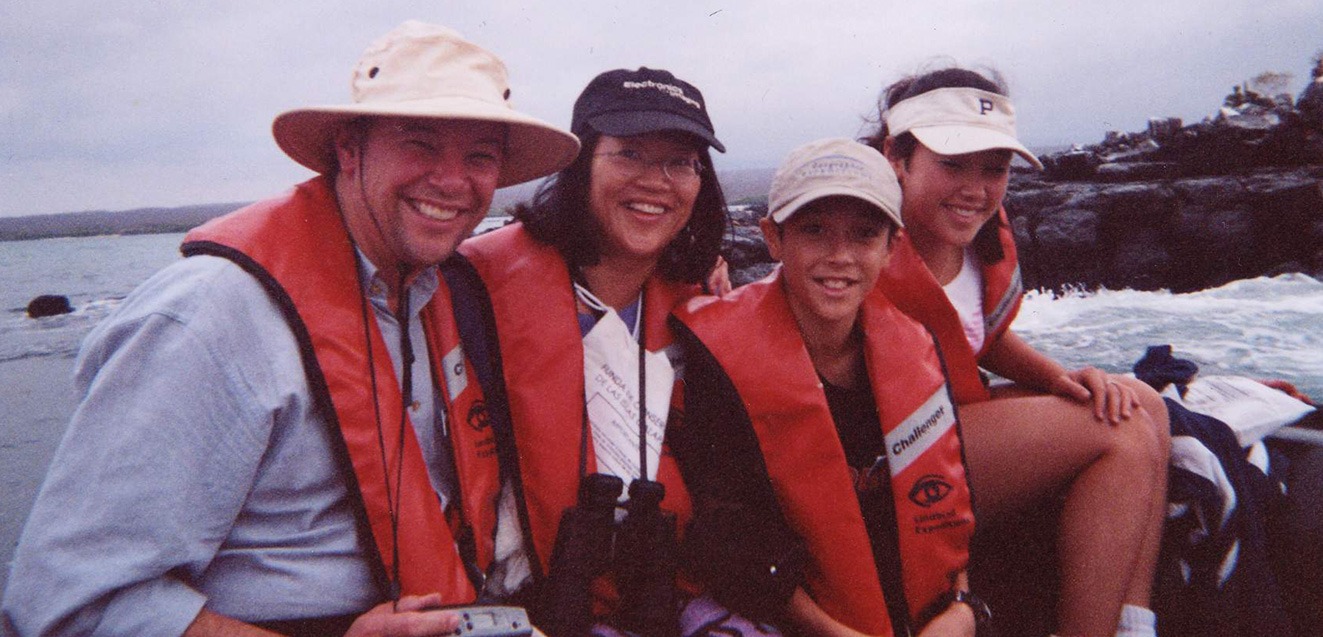 GeoEx's Don George with his family on a panga in the Galapagos Islands