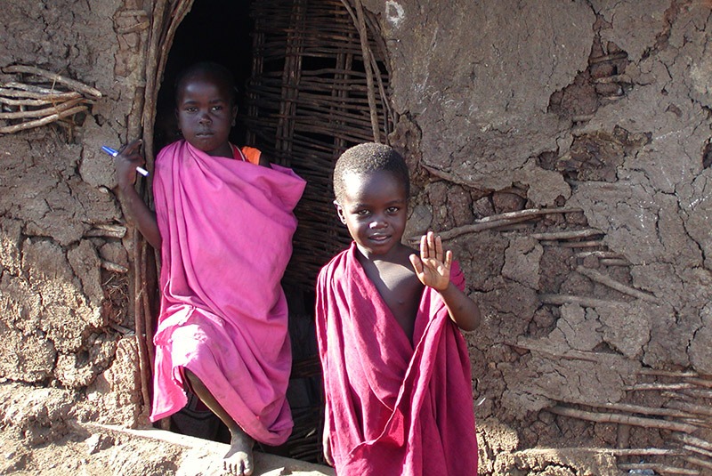 Waving children in Maasai village, Kenya