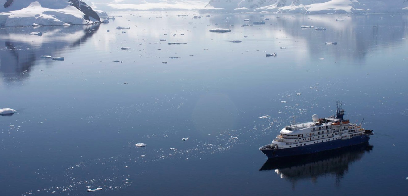 A cruise ship in the waters of Antarctica