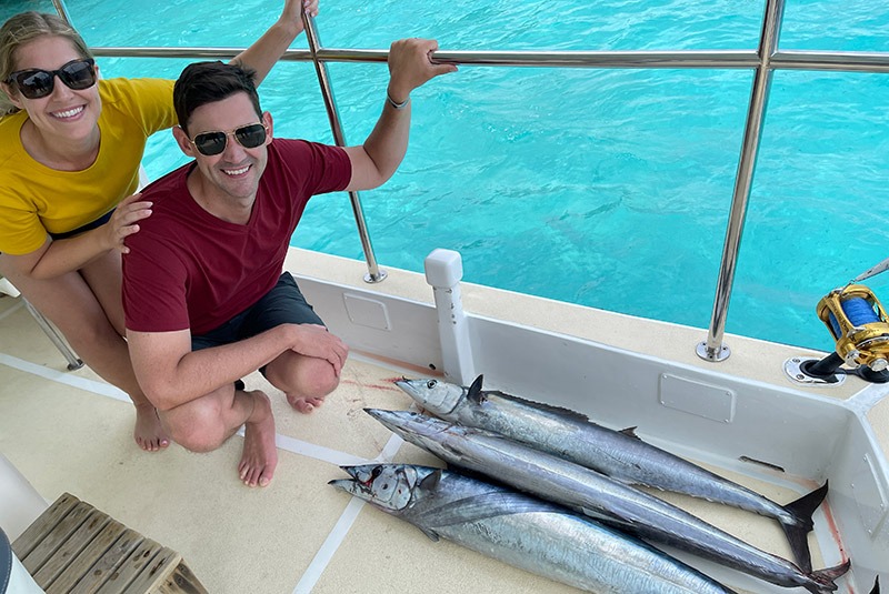 GeoEx honeymooners enjoying a fishing excursion in the Maldives