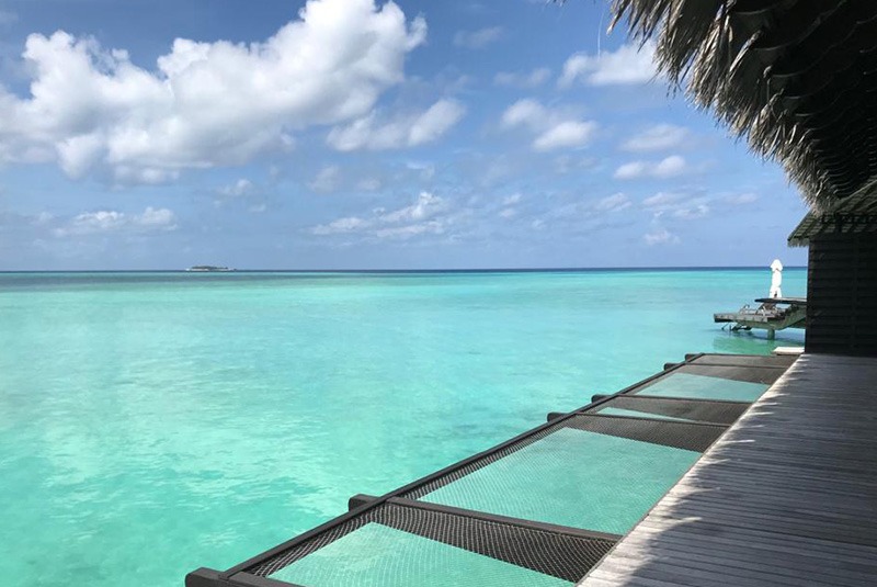 Looking out over turquoise waters from One&Only Reethi Rah, Maldives