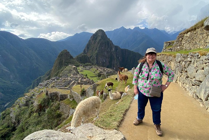 GeoEx staff member Tina Liadis at Machu Picchu, Peru