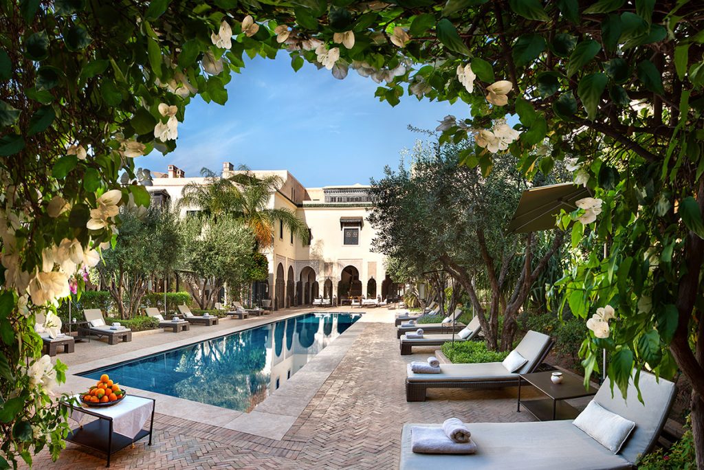 Pool and exterior courtyard of Villa des Orangers in Marrakech, Morocco