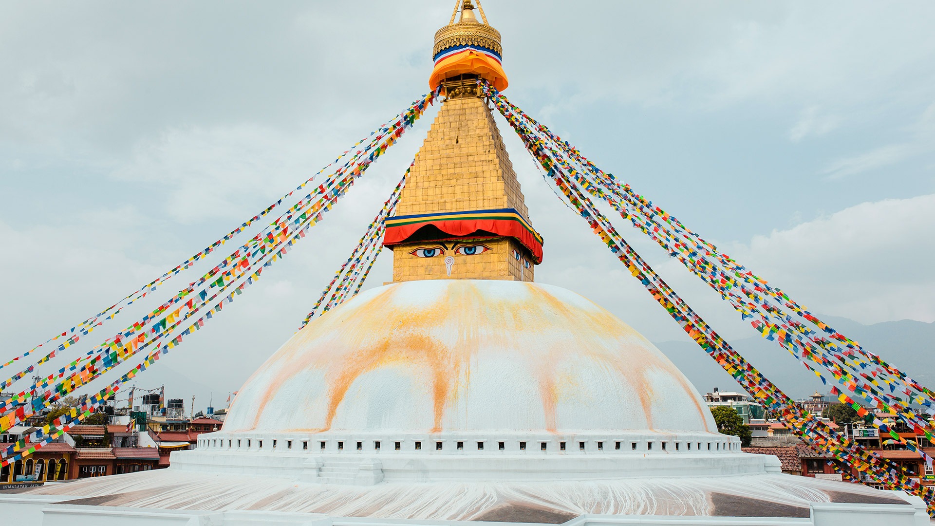 Prayer flags surround the Bodhnath Stupa in Kathmandu, Nepal
