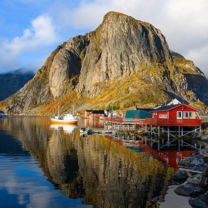 Traditional rorbuer cabin over water in Lofoten, Norway