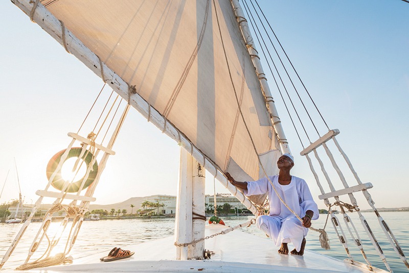 Nubian sailor on felucca near Aswan, Egypt